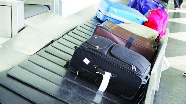 Дамские сумки и портфели могут быть исключены из ручной клади